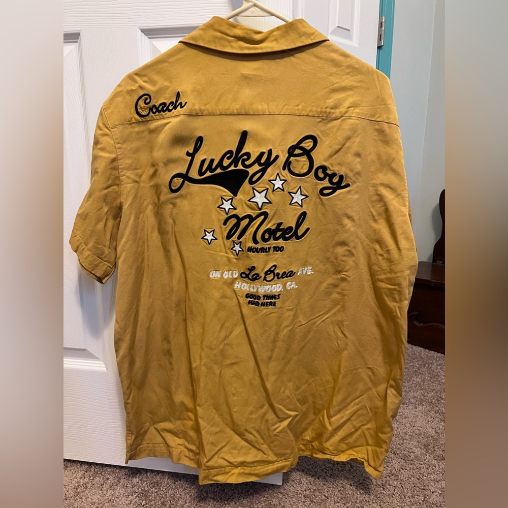 Men’s gently worn Lucky Brand Bowl-a-Rama sizeL distressed yellow Bowlers Shirt